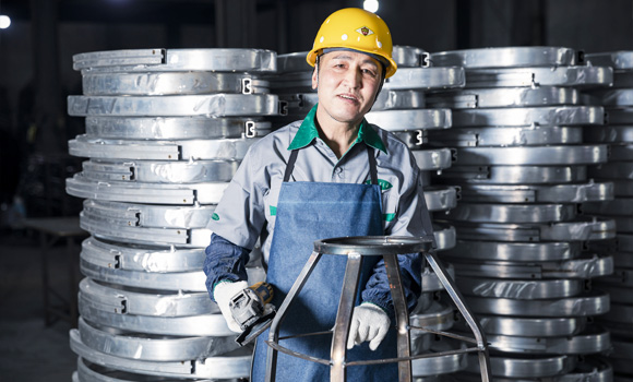 A welder is in the workshop