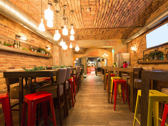 Metal chairs in bar scene