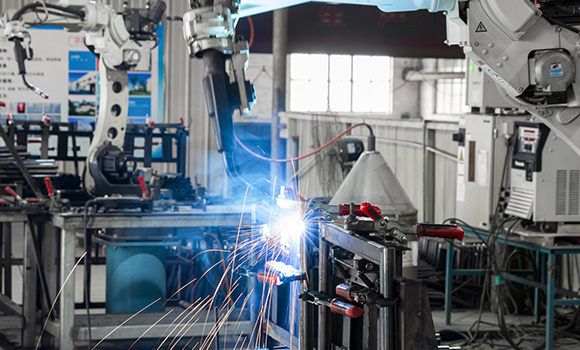 A row of automatic welding robots