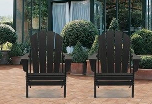 A foldable set of black Pvc Adirondack chairs