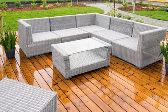 Patio furniture outside on a rainy day